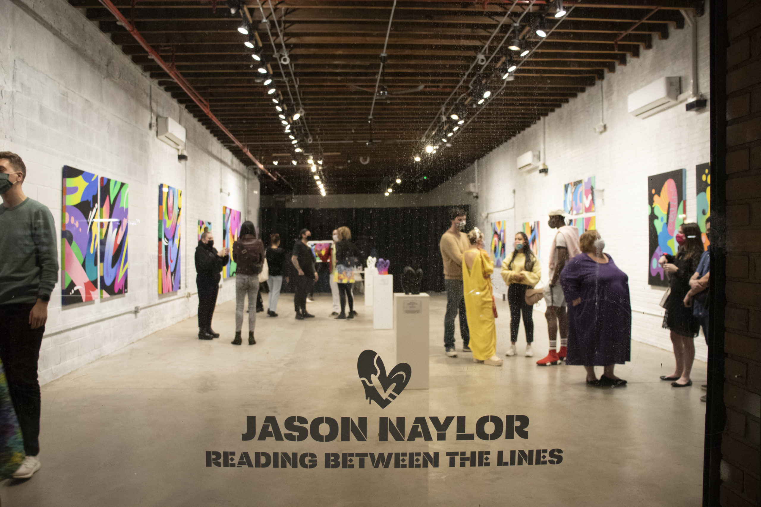 Street view of 'Reading Between The Lines' Jason Naylor's premiere solo exhibition.